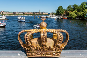Gilded crown on the Skeppsholmsbron bridge in Stockholm, Sweden, Europe