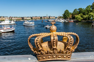 Gilded crown on the Skeppsholmsbron bridge in Stockholm, Sweden, Europe