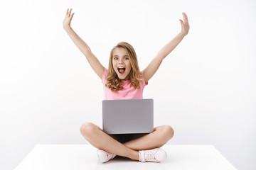Happy cheerful cute blond girl child having fun spend summer holidays away from school, enjoy...