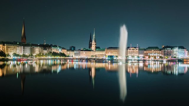 A panoramic view of the Hamburg skyline of the Binnenalster taken from Lombardsbruecke Night hyperlapse view of the central part of the old city of Hamburg