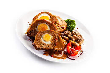 Roast stuffed meat with boiled egg