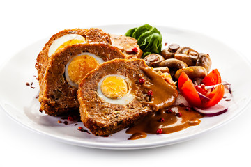 Roast stuffed meat with boiled egg