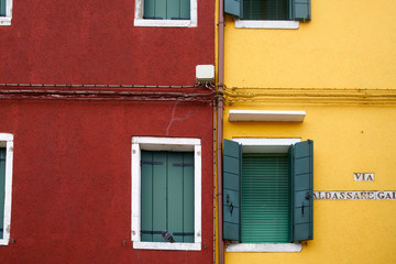 Fototapeta na wymiar Venice / Italy - September 29th 2019: Colorful streets of Burano, Venice, Italy