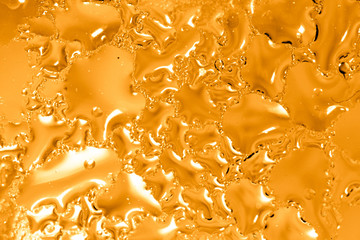 Drops of water on a gold background