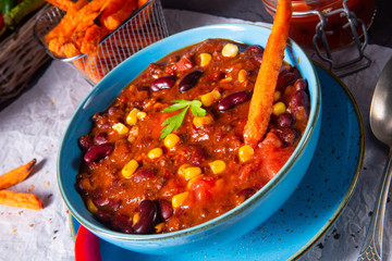 chili con carne with sweet potato and spicy nachos