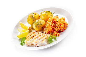 Fish dish - fried fish fillet boiled potatoes and vegetables