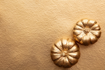 Golden thanksgiving pumpkin overhead flay lay composition