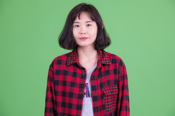 Obraz premium Portrait of beautiful Asian hipster woman with short hair