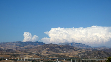 Large white cloud against blue sky