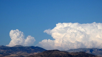 Large white cloud against blue sky