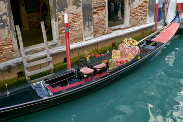 Venice / Italy - September 29th 2019: Gondolier rowing a gondola in Grand Canal © Roberto Vivancos
