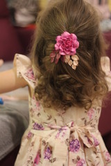 Naklejka premium curly beautiful girl received a Christmas present