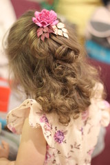 Naklejka premium curly beautiful girl received a Christmas present