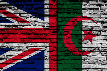 Flag of Algeria and England on brick wall