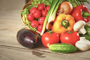 Vegetables . Fresh Bio Vegetable in a Basket. Over Nature Backg