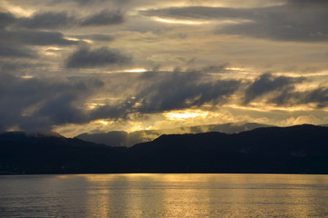 Sunset over a Norwegian archipelago. Seascape.