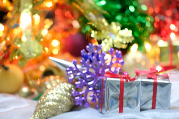 christmas balls and decorations on wooden background