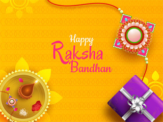 Happy Raksha Bandhan celebration concept with top view of gift box and worship plate on orange seamless background. Can be used as greeting card design.