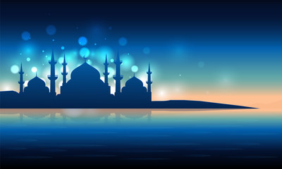 Ramadan Kareem banner or poster design with view of Mosque in shiny moonlight night.