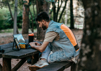Fototapeta premium Self employed man concentrated while is working with a laptop