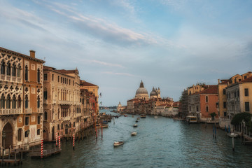 Fototapeta na wymiar Grand Canal and cathedral of Santa Maria della Salute view from Accademia bridge. Venice, Italy.
