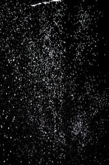 Splash of water drops on a black background