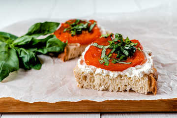 Tomato And Ricotta On Toast With Fresh Basil