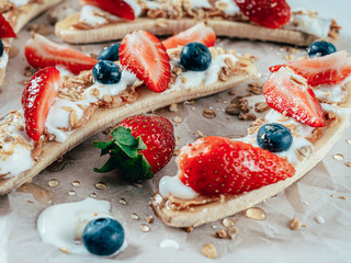 Banana Split With Strawberries, Blueberries, Almond Butter And Honey