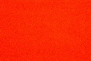 Orange textured felt fabric material background