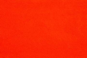 Orange textured felt fabric material background