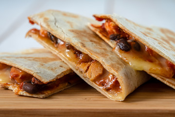 Chicken And Black Beans Quesadillas With Cheese And Salsa