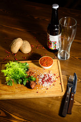 Sliced meat. Grilled beef steak on wooden cutting board. Grilled meat.