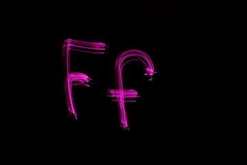 Long exposure photograph of  the letter f in pink neon color, in upper case and lower case, parallel lines pattern against a black background. Light painting photography.