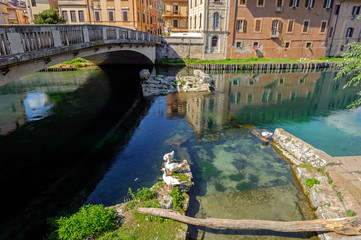 Rieti, city of central Italy. Velino river with ancient houses and Roman bridge. - obrazy, fototapety, plakaty
