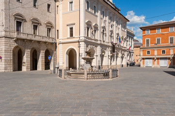 Fototapeta na wymiar Rieti, Lazio, Italy. The town hall and the dolphin fountain.
