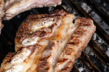 Barbecue grill with grilled pork ribs