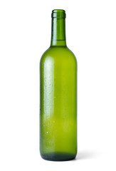 Bottle of very cold white wine fresh from the fridge with white background - image