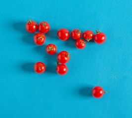 Cherry tomatoes are on the pool table.