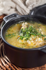 Barley soup with vegetables and chicken.