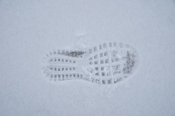 Hiking shoe track on snow