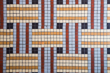 small vintage style mosaic tiles pattern in a kitchen floor