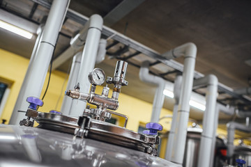 Craft beer brewing equipment in brewery! Alcoholic drink production