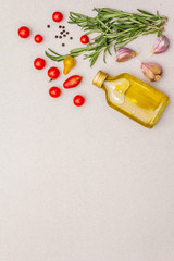 Cooking food background. Fresh rosemary, garlic clove, olive oil, black pepper