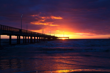 Fototapeta na wymiar Sunrise at the Fishing Pier in Texas, Gulf of Mexico