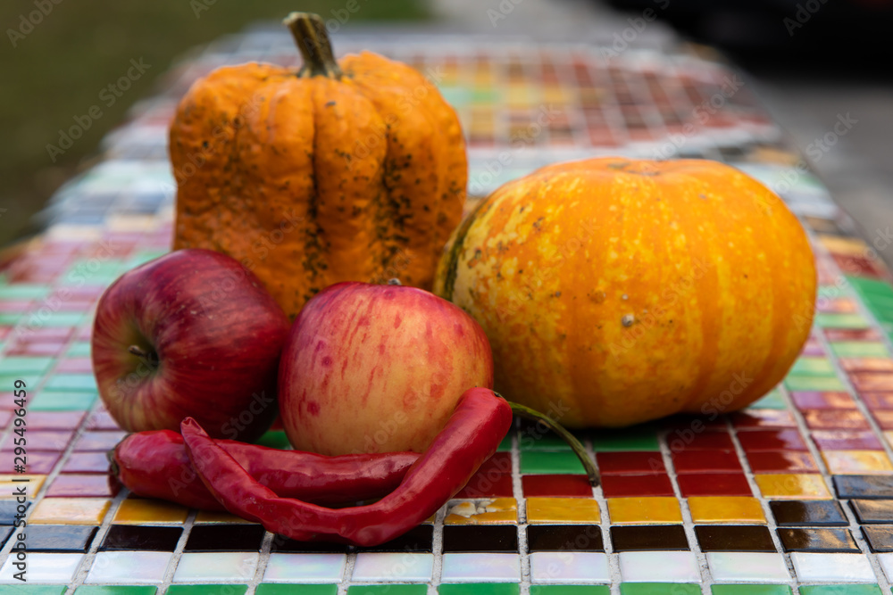 Wall mural autumn vegetables on mosaic background