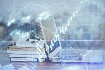 Forex Chart hologram on table with computer background. Double exposure. Concept of financial markets.
