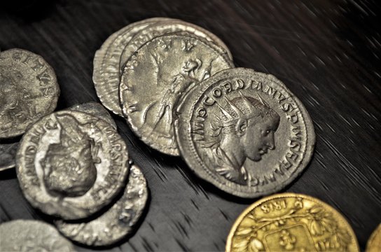 Denars are old Roman coins of silver with its Emperors and history