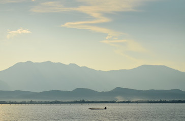 peaceful of lake with mountain view at Phayao lake in Thailand