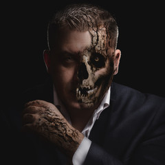Face, Skull. Portrait of a business man.