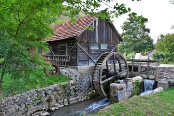 an old water mill - obrazy, fototapety, plakaty